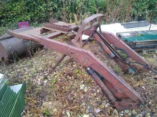 front end loader off Ford 4600 may be McCormic or Macconnell