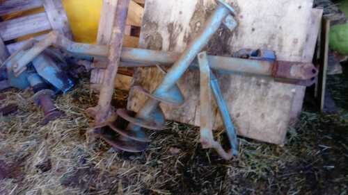 tractor post hole borer, working order. Vintage borer attachment, three sizes.