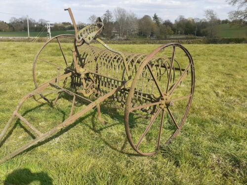 Vintage bamford hay rake with seat